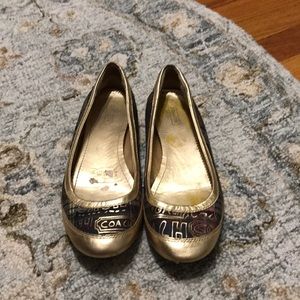 Coach flat golden shoes